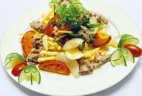 Saut’edsquid with onion and pineapple